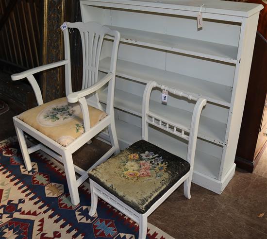 Chippendale style painted elbow chair, an Edwardian painted nursing chair and a painted open bookcase